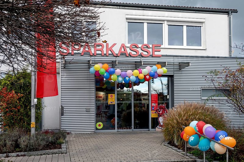Sparkasse branch decorated on World Savings Day, Eckental, Miittelfranken, Bavaria, Germany