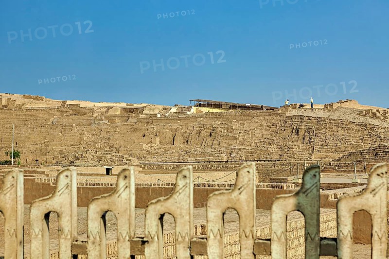 Historic sites in a desert landscape under clear blue skies, the archeological city of Huaca Pucllana near Lima in Peru