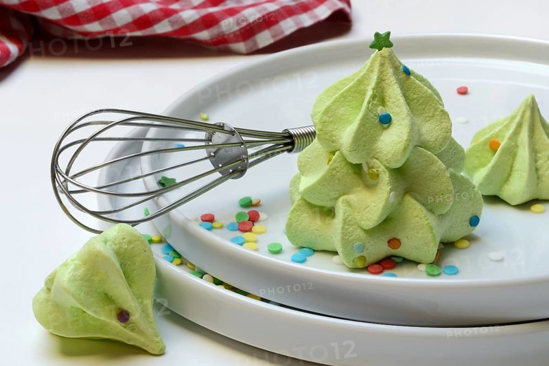 Meringue in the shape of a Christmas tree and whisk, Christmas cookies, meringue