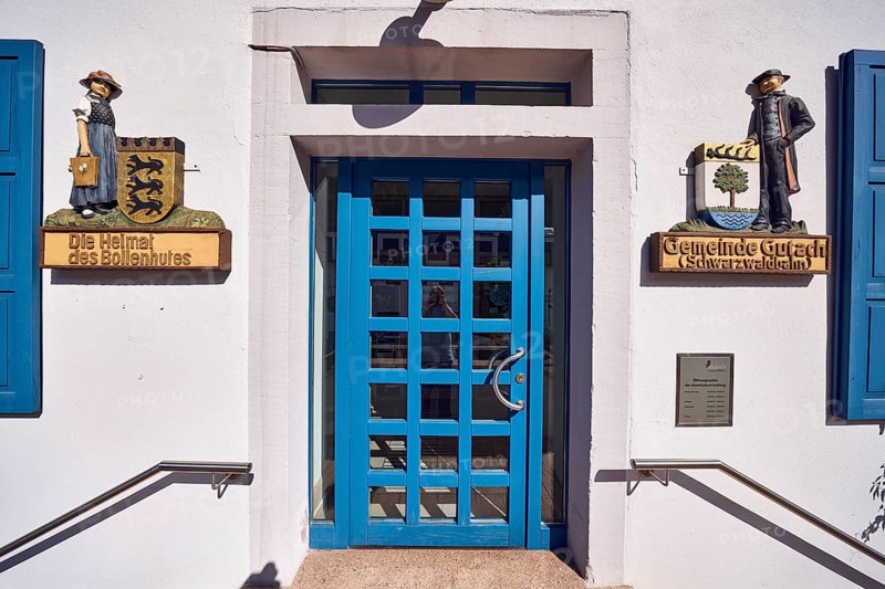 Town Hall, municipality of Gutach Schwarzwaldbahn, The home of the Bollenhut, façade with entrance door and signs, stainless steel railing, sunny, main street, Gutach Schwarzwaldbahn, Black Forest, Ortenaukreis, Baden-Württemberg, Germany