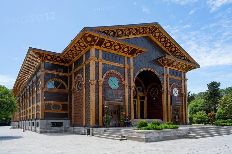 Decorated wooden building with decorative elements and an inviting entrance under a blue sky, Summer Theatre, Batumi, Black Sea, Ajara region, Adjara, Autonomous Republic, Georgia