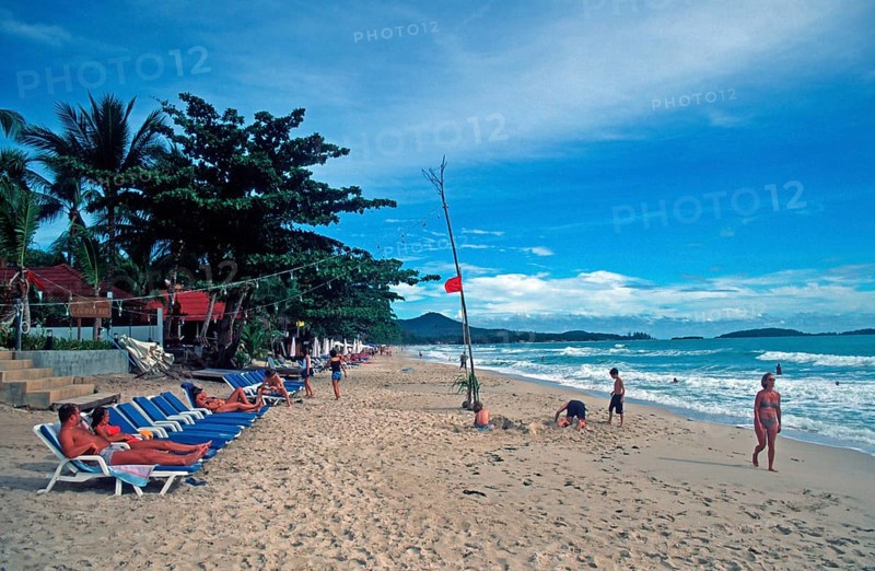 People, deckchairs, Chaweng Beach on Ko Samui, Thailand, December 2002, vintage, retro, old, historic