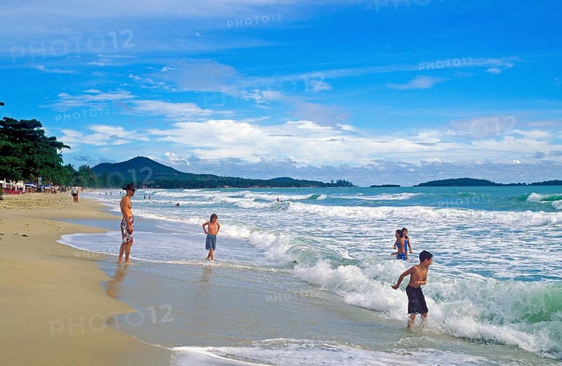 People, children, sea, surf, Chaweng Beach on Ko Samui, Thailand, December 2002, vintage, retro, old, historic