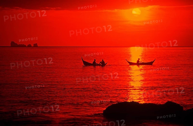 Fishing boats at sunset, silhouettes, orange filter, Ko Lanta island, Thailand, December 2002, vintage, retro, old, historic