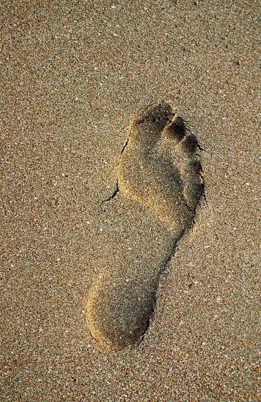 Footprint on the beach on the island of Ko Lanta, Thailand, December 2002, vintage, retro, old, historic