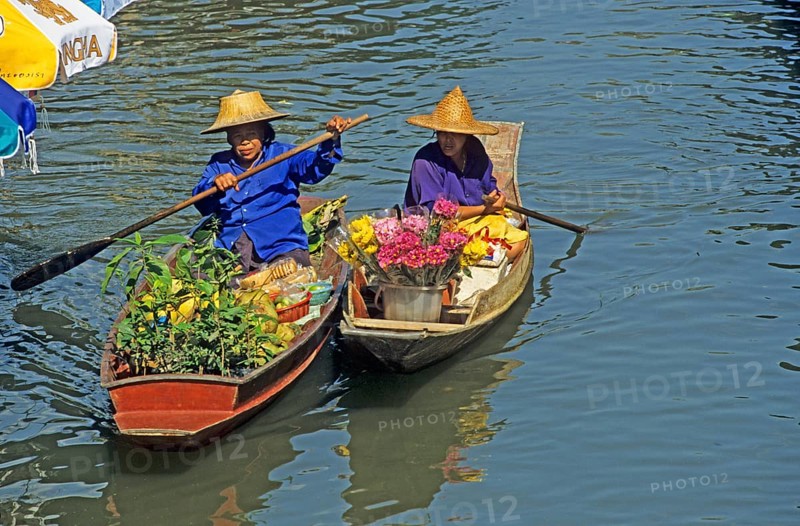 Merchants in their boats at Damnoen Saduak Floating Market, Thailand, December 2002, vintage, retro, old, historic