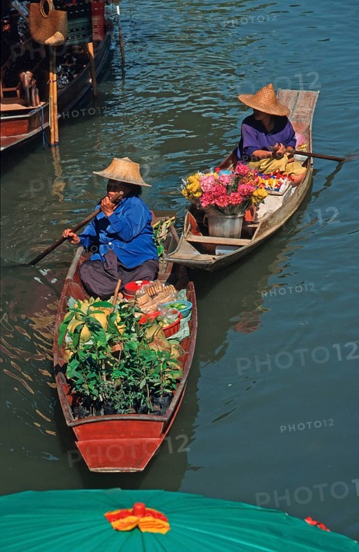 Merchants in their boats at Damnoen Saduak Floating Market, Thailand, December 2002, vintage, retro, old, historic