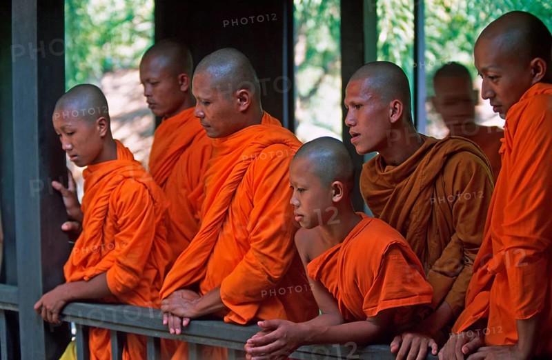 Monks watch performance, Samphran Elephant Ground and Zoo near Bangkok, Thailand, December 2002, vintage, retro, old, historic