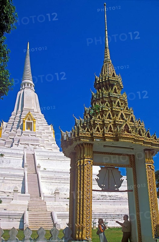 People, chedi, archway, white and gold temple Wat Phukao Thong, Ayutthaya, Thailand, December 2002, vintage, retro, old, historic