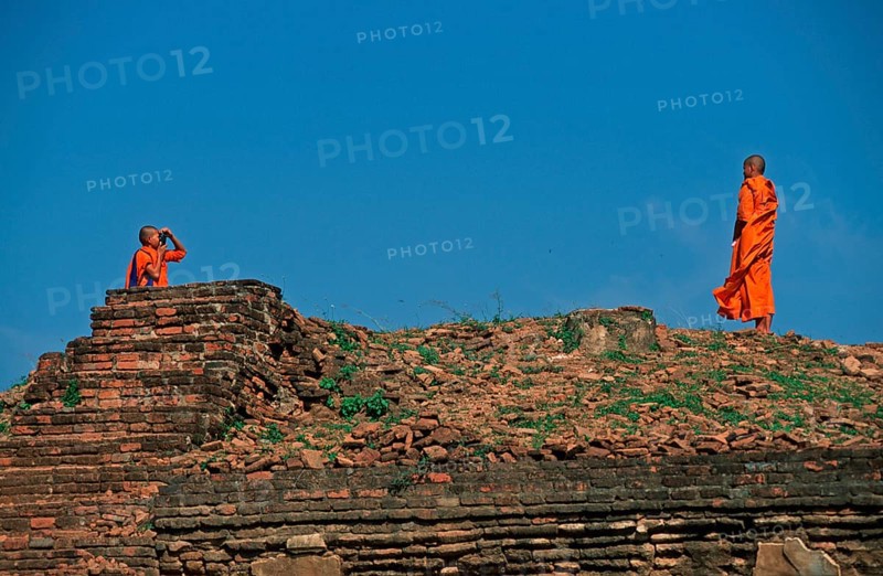 Monk takes photo of monk at Wat Phra Si Sanphet, Ayutthaya, Thailand, December 2002, vintage, retro, old, historic