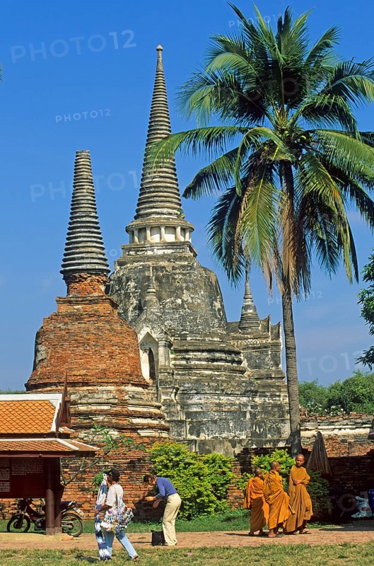 Monks, chedis, palm tree at Wat Phra Si Sanphet, Ayutthaya, Thailand, December 2002, vintage, retro, old, historic
