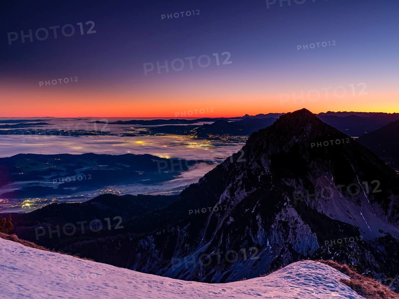 Dawn in the mountains, view of Salzburg with fog, Hochstaufen, Zwiesel, Bad Reichenhall, Berchtesgadener Land, Upper Bavaria, Bavaria, Germany
