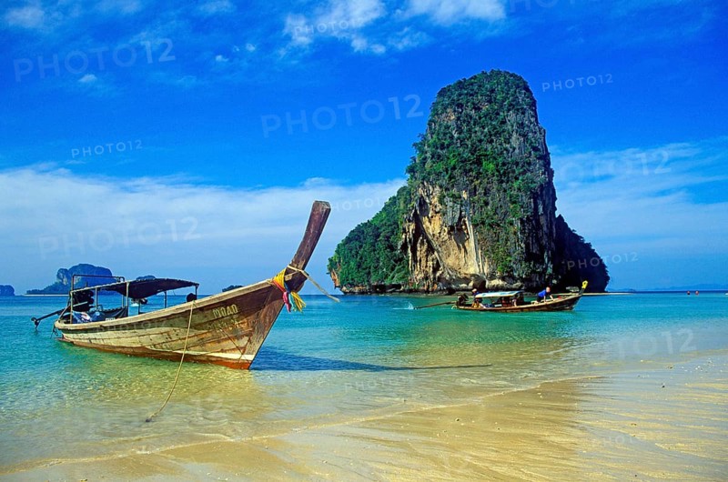 Rocks in the sea and longtail boats on Pranang Cave beach, two years in front of the tsunami, Krabi, Thailand, December 2002, vintage, retro, old, historic