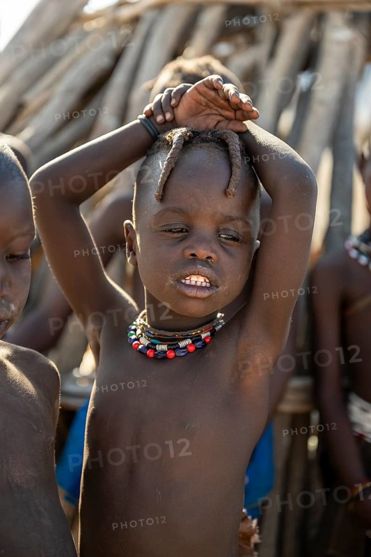 Portrait, Himba boy, traditional Himba village, Kaokoveld, Kunene, Namibia