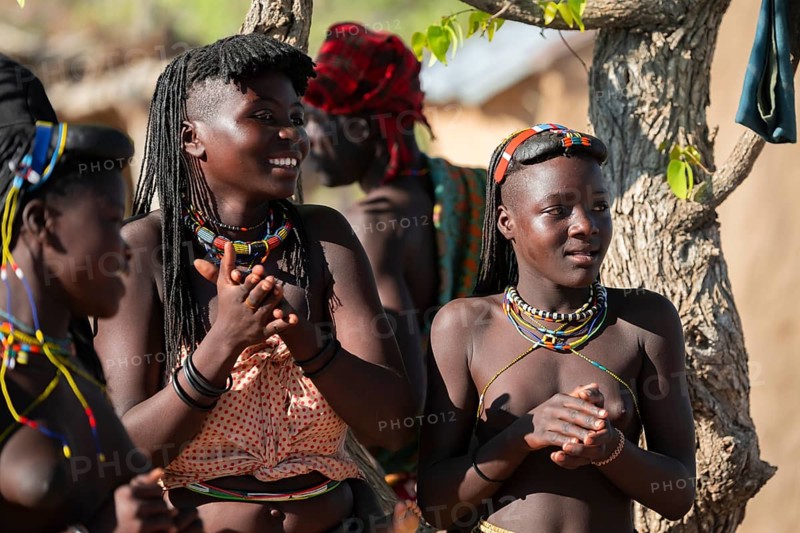 Traditional dance, brightly decorated woman of the Hakaona tribe, also Havakona or Hakawona, near Opuwo, Kunene, Namibia