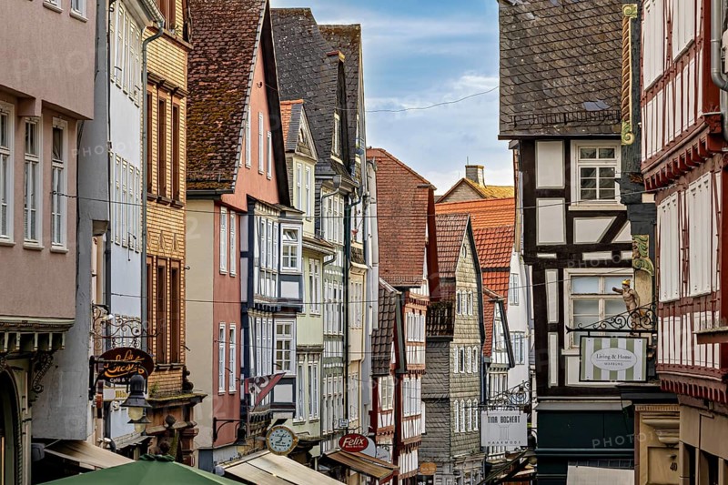 Picturesque street scene of an old town with closely adjacent half-timbered houses, The historic old town of Marburg an der Lahn in Hesse