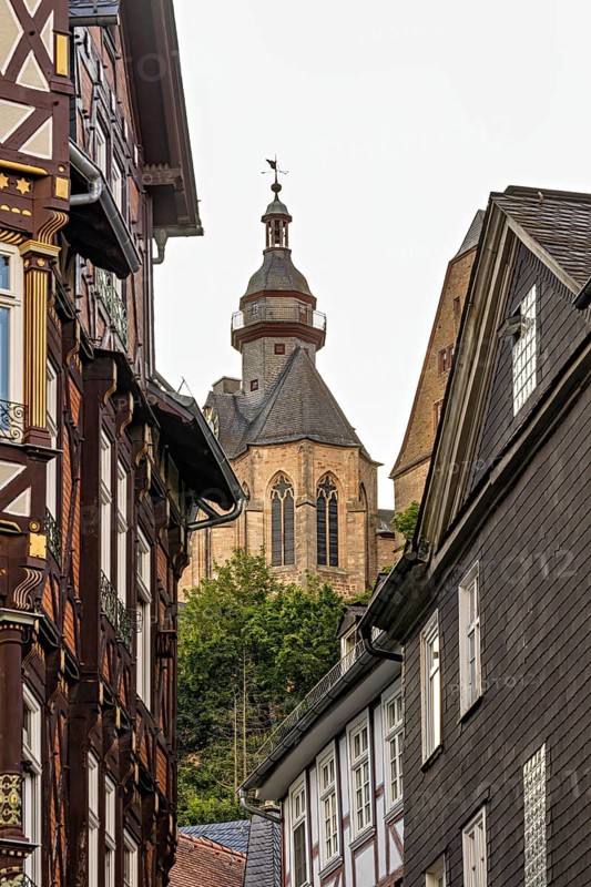 Detailed architecture shows half-timbered houses and a church above the roofs, The historic old town of Marburg an der Lahn in Hesse