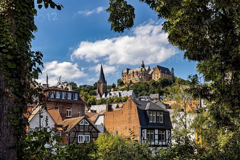 Picturesque view of Marburg's old town with historic half-timbered houses and a castle on a hill, The Landgrave Castle of Marburg in Hesse
