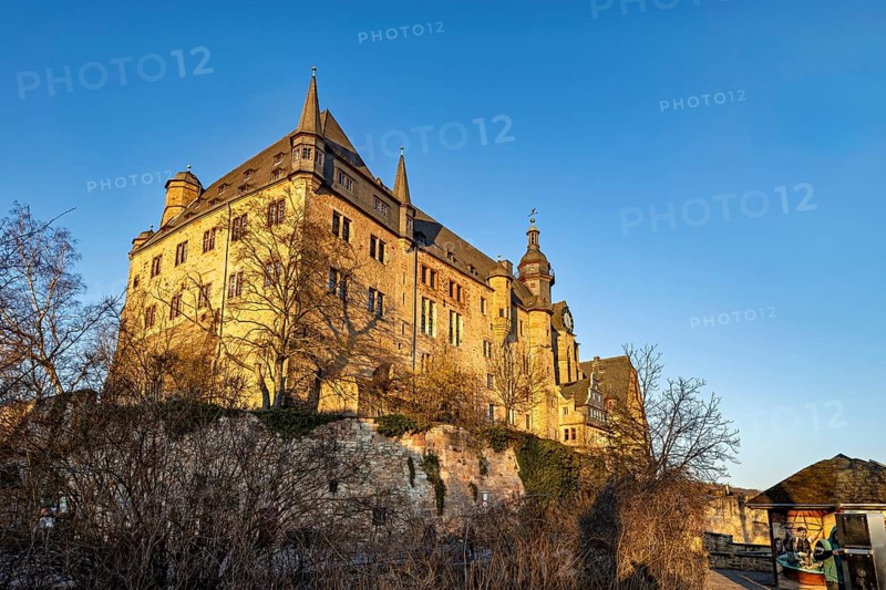Majestic castle in Marburg in the warm light of the evening sun and a clear sky, The Landgrave Castle of Marburg in Hesse