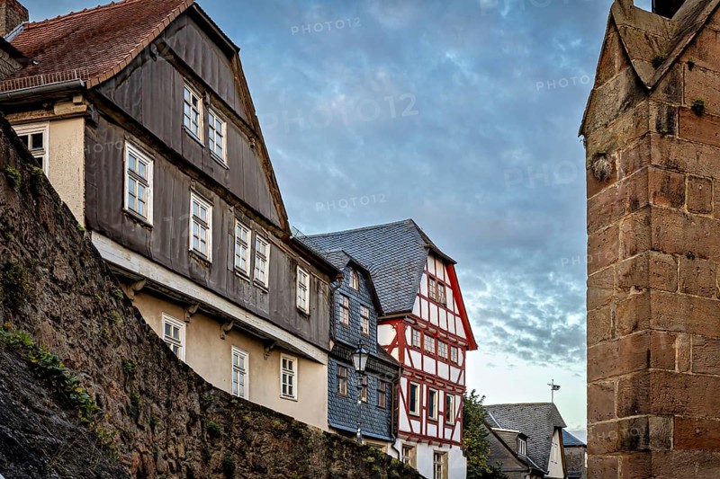 Half-timbered houses and city walls in a cozy evening mood, The historic city center of Marburg in Hesse