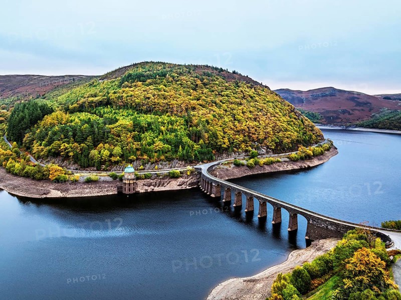 Autumn over Garreg Ddu Dam from a drone, Elan Valley, Caban-Coch Reservoir, Rhayader, Wales, UK
