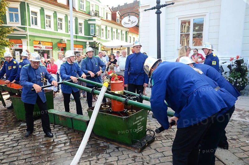 A popular event every year in August is when the Ystad Volunteer Fire Brigade takes the old fire pump made in 1850 to the square and sprays water on the assembled children, who are then baptized as true Ystad residents. Ystad, Skåne County, Sweden, Scandinavia