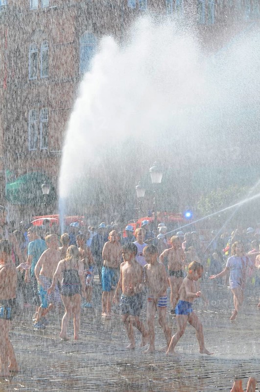A popular event every year in August is when the Ystad Volunteer Fire Brigade takes the old fire pump made in 1850 to the square and sprays water on the assembled children, who are then baptized as true Ystad residents. Ystad, Skåne County, Sweden, Scandinavia