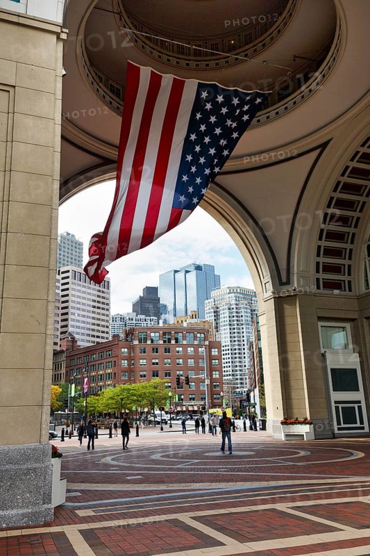 American flag fluttering, distinctive archway, Boston Harbor Hotel, Rowes Wharf, passers-by, Freedom Trail, Financial District, Downtown, Boston, Massachusetts, New England, USA