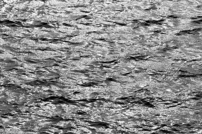 Water surface with waves and light reflections, black and white, Möhnesee, Möhnetalsperre, North Rhine-Westphalia, Germany