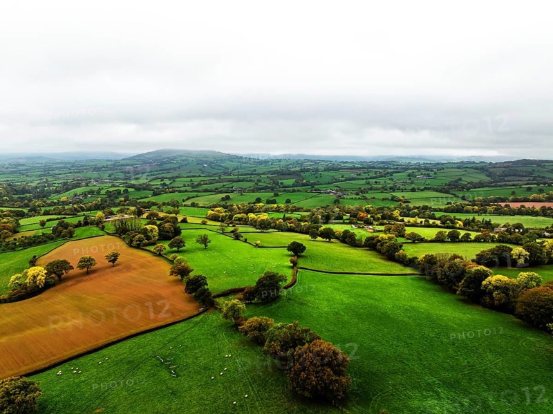 Autumn colours over Wales Farms and Fields from a drone, Grosmont, Abergavenny, Monmouthshire, Wales, UK