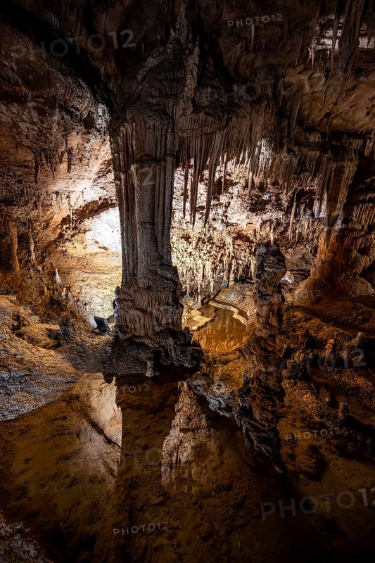 Stalactites and stalagmites, water basins and rock formations in a stalactite cave, Grotta del Fico, Gulf of Orosei, Baunei, Sardinia, Italy