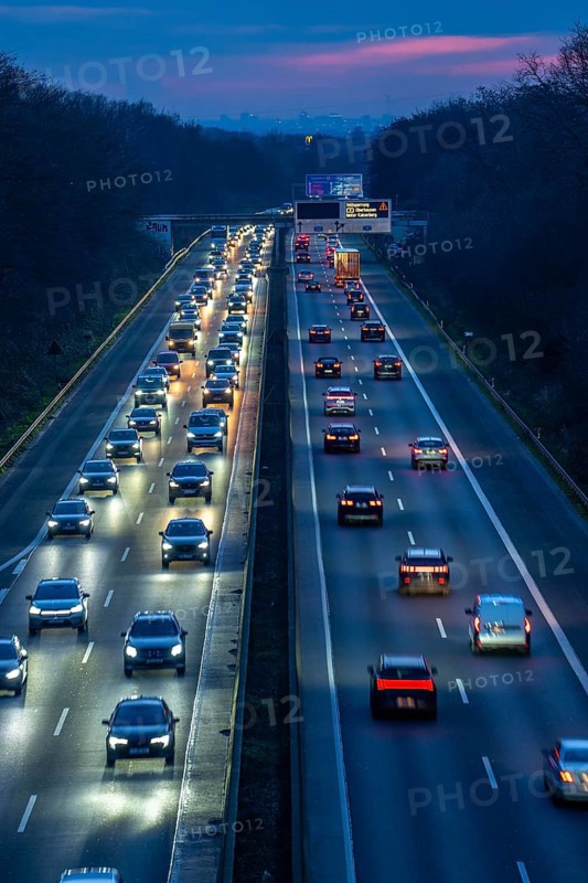 Evening traffic on the A52 motorway, between Düsseldorf and Essen, in front of the Breitscheid motorway junction, partly slow rush hour traffic, looking south, North Rhine-Westphalia, Germany