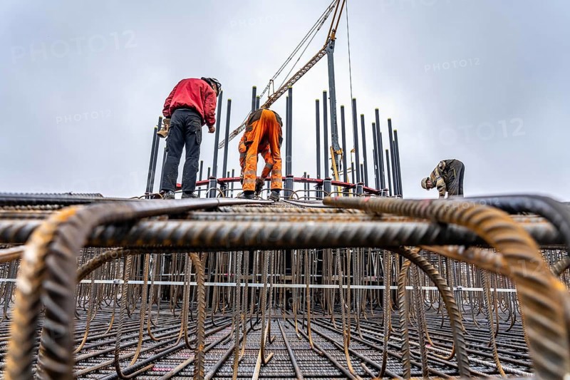 Assembly of reinforcing steel for the reinforced concrete foundation of a wind turbine, a mesh of rebar and rebar mesh, over 100 tons of reinforcing steel were used, the wind turbine will have a hub height of 160 meters, part of a new wind farm in Sauerland, near Balve, North Rhine-Westphalia, Germany