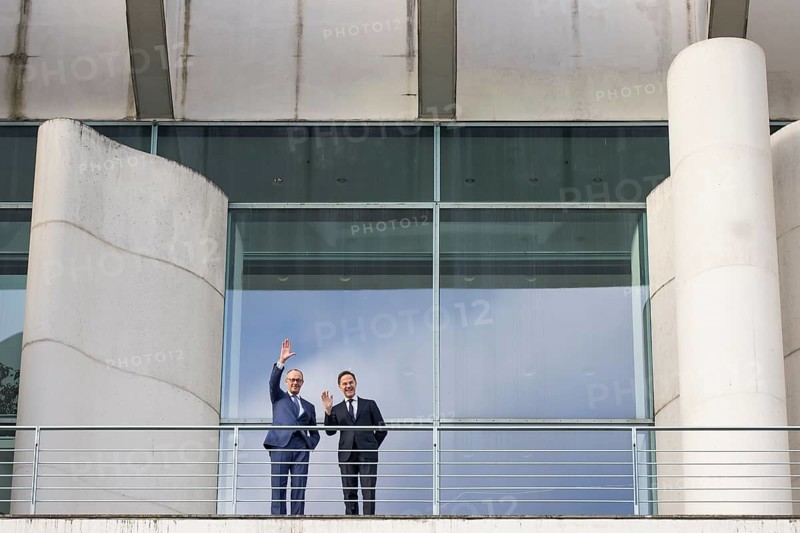 Friedrich Merz (Chancellor of the Federal Republic of Germany, CDU) and Mark Rutte (Secretary General of NATO) wave from the terrace in front of a joint one-on-one meeting at the Federal Chancellery, Berlin, 11 December 2025