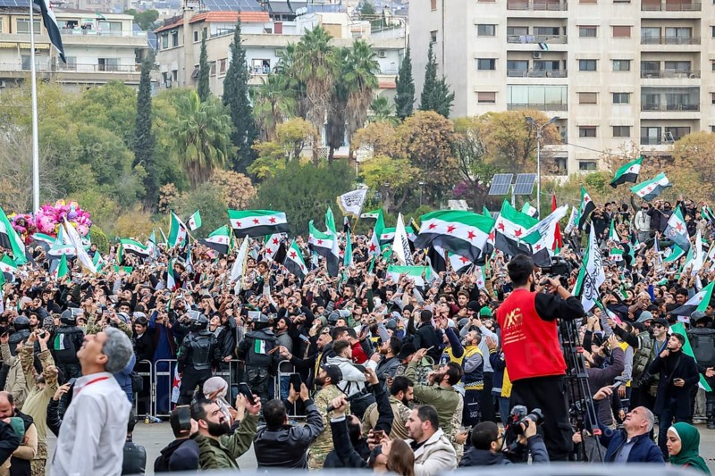 Damascus, Syria – December 08, 2025: A military parade by Syrian army units marking the first anniversary of liberation and the change of Assad's regime, held in Umayyad Square in central Damascus, attended by thousands of people, Damascus, Damascus, Syria