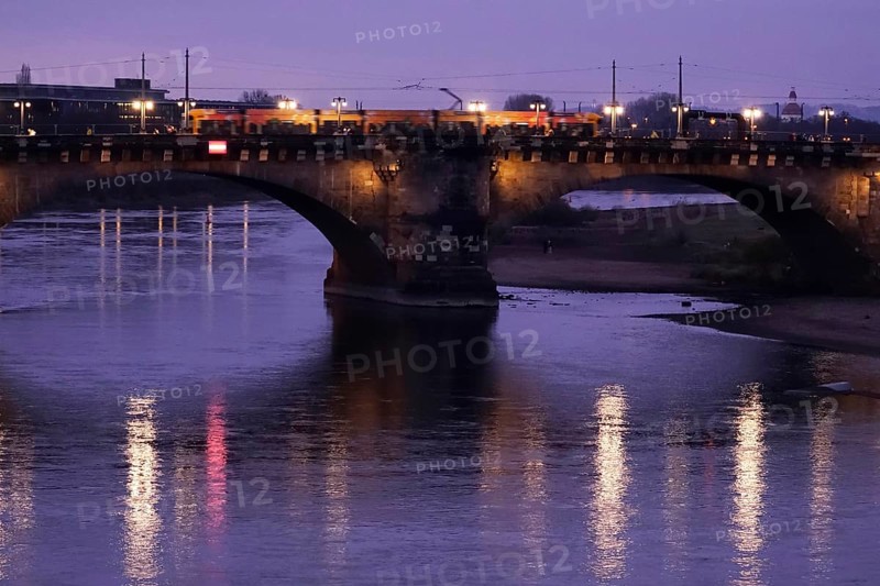 Augustus Bridge Dresden with a tram, Elbe with reflection, winter, Saxony, Germany
