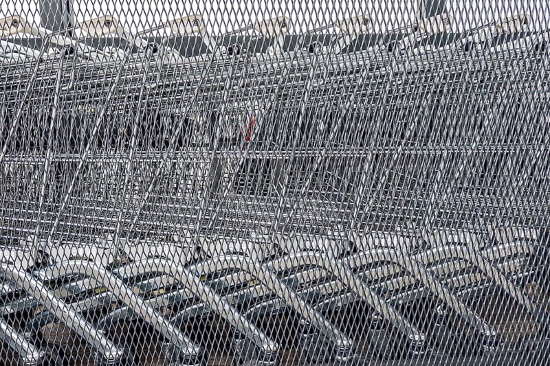 Close-up of several unused shopping carts, economic crisis, consumption