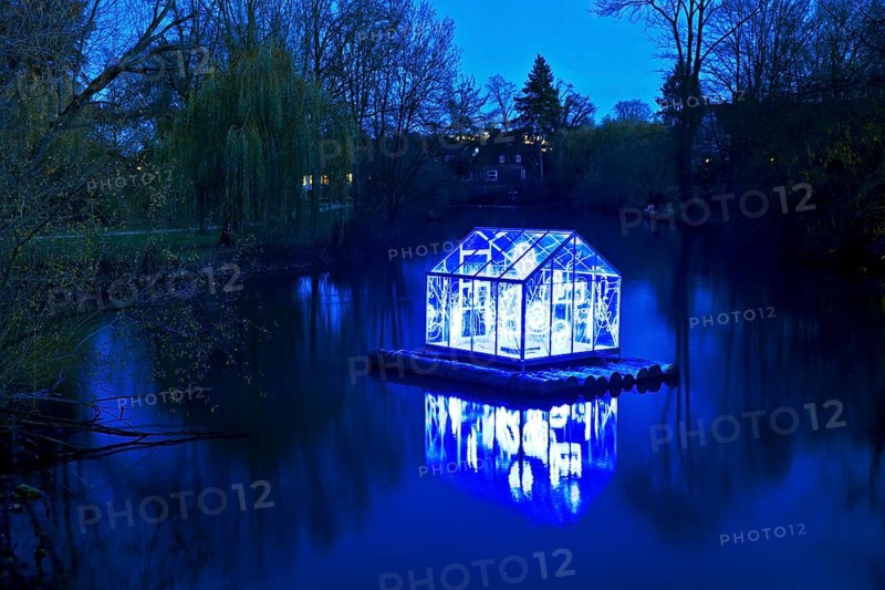 The river Lippe with the artwork Arche by Christoph Hildebrand at night, Lichtpromenade Lippstadt, North Rhine-Westphalia, Germany
