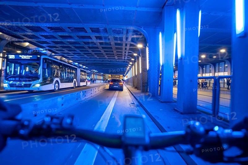 Cycling in the city, in the dark, in the evening, cycling underpass at the main train station, in downtown Essen, North Rhine-Westphalia, Germany