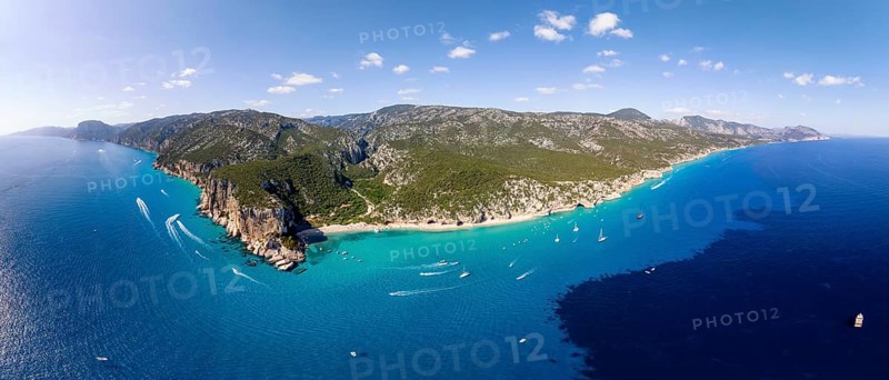 Picturesque rocky coast, cliffs and Cala Luna beach, aerial view, Golfo di Orosei, Baunei, Sardinia, Italy