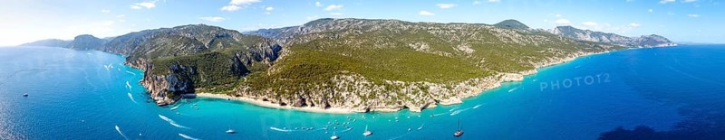 Panorama, picturesque rocky coast, cliffs and Cala Luna beach, aerial view, Golfo di Orosei, Baunei, Sardinia, Italy