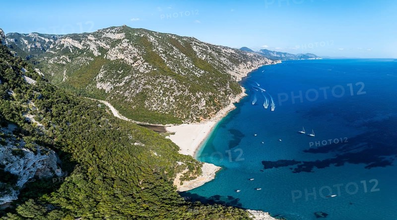 Picturesque rocky coast, cliffs and Cala Sisine beach, aerial view, Golfo di Orosei, Baunei, Sardinia, Italy