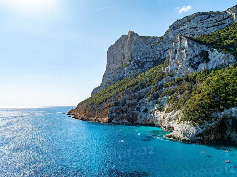 Picturesque rocky coast, cliffs and turquoise blue sea, aerial view, Golfo di Orosei, Baunei, Sardinia, Italy