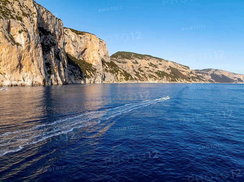 Motorboat rides on picturesque rocky coast ImmorgenLicht, cliffs, Golfo di Orosei, Baunei, Sardinia, Italy