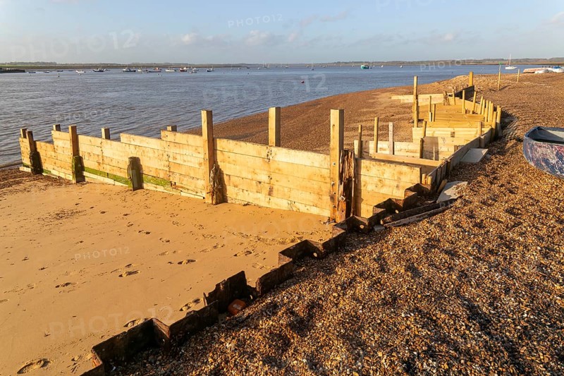 Temporary coastal defences erected by Bawdsey Haven Yacht Club, response to rapid erosion beach depletion, River Deben, Bawdsey, Suffolk, England, UK Nov 2025