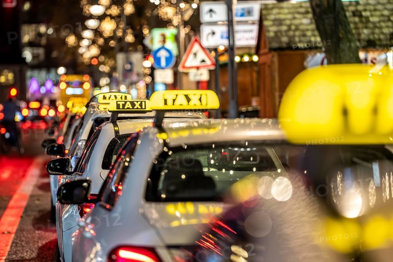 Taxi stop, on Tauentzienstraße in Berlin, in the evening, Germany