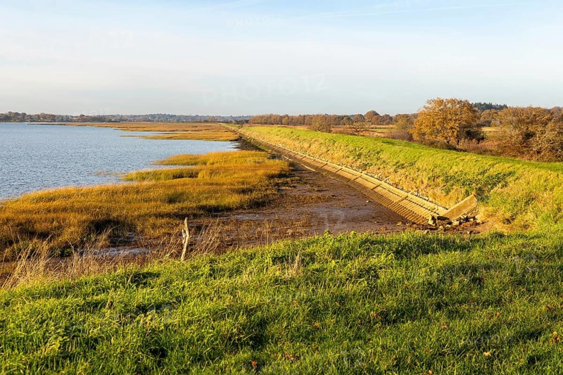 River Deben earthwork bank flood defence wall, Sutton, Suffolk, England, UK