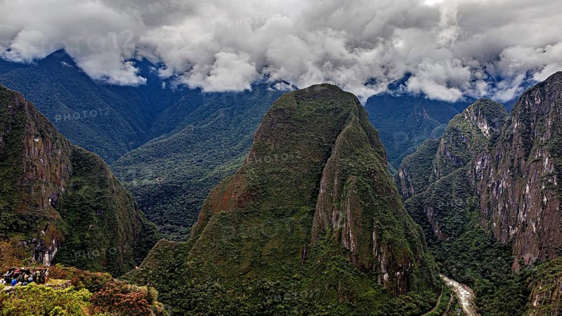 Impressive mountain landscape under dramatic clouds, The Urubamba Valley near Machu Picchu in Peru