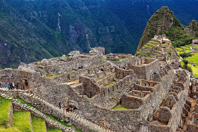 Comprehensive Ruin Landscape with Views of Mountains and Clouds, The Ruins of the Inca City of Machu Picchu in Peru