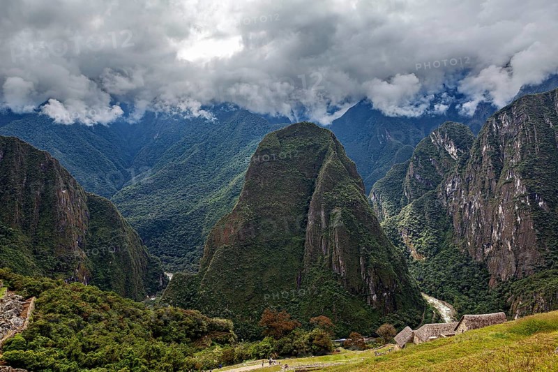 Majestic mountains under dramatic cloudy skies, The Urubamba Valley near Machu Picchu in Peru